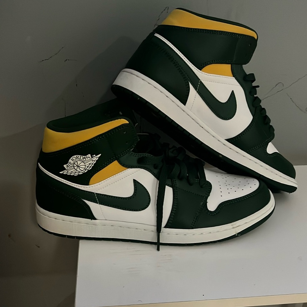 Green yellow and white Jordan size 11
